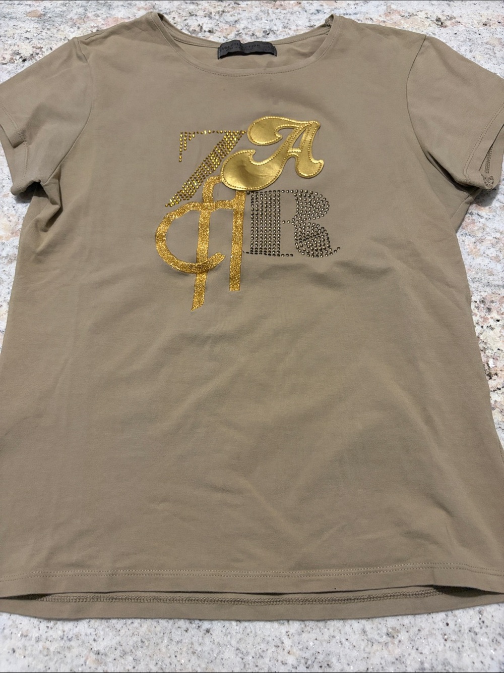 10/$30 Zara Embellished Taupe Graphic Tee with Gold Accents